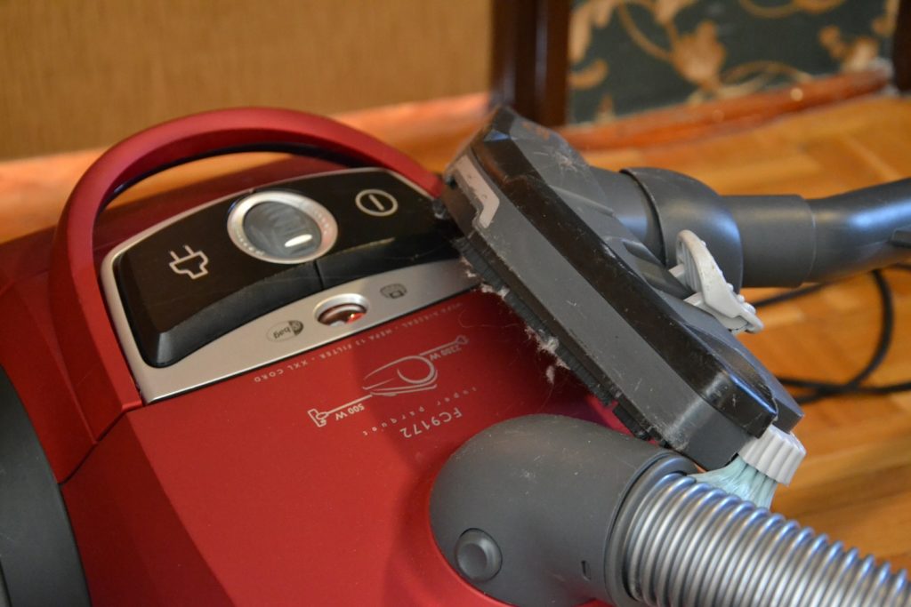 A vacuum cleaner with an upholstery attachment is guaranteed to be a big help!