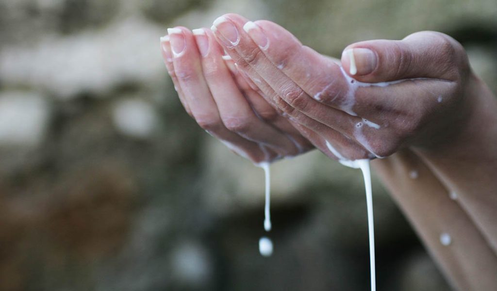 soap dripping from hands