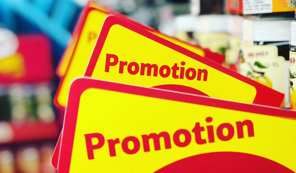 Yellow and red promotional signs