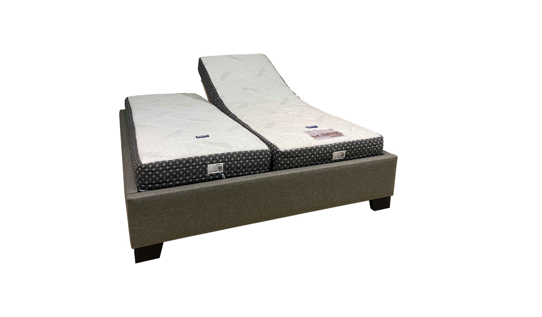 Two sinlge XL mattresses on one base. The mattress on the right it propped up, to showcase the versatility of the Magniflex Adjustable Bed.