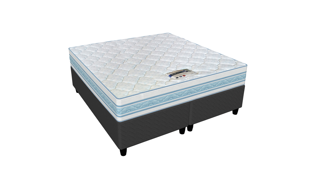 A charcoal grey bed base with a blue lined white mattress on top. The Cloud Nine Blue 50th Anniversary bed.